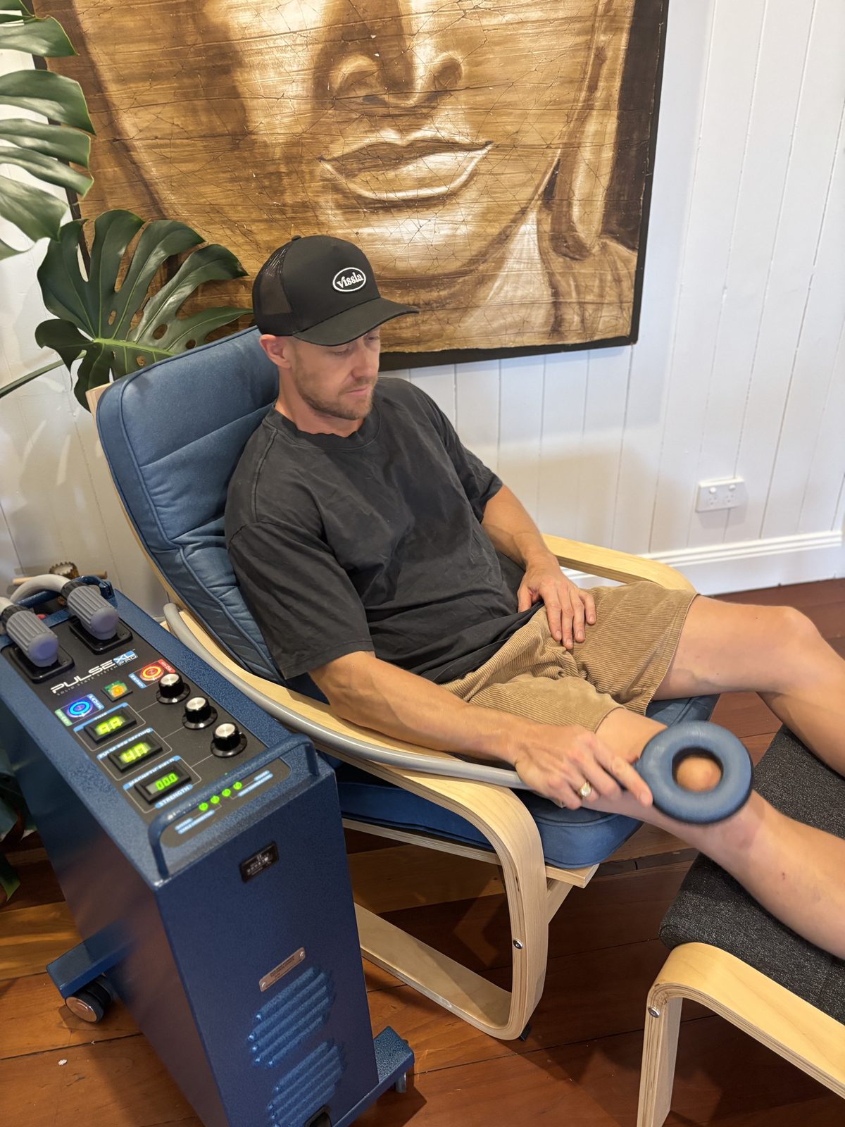 Targeted PEMF ring applicator over a client's knee